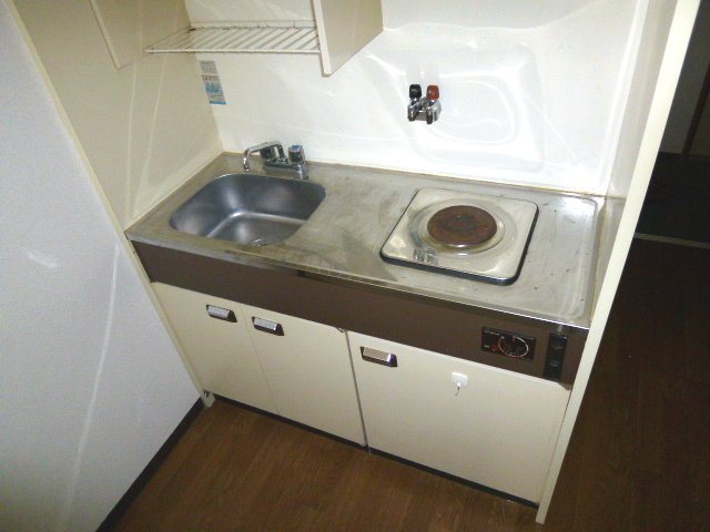 Kitchen. It is spacious kitchen space. 