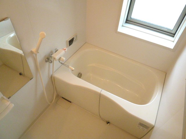 Bath. If there is a window, It is spacious tub charm