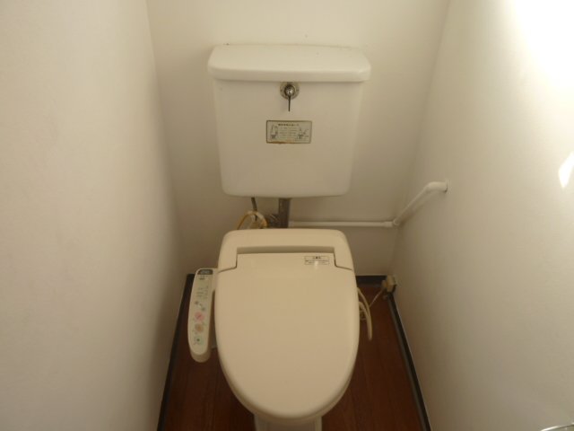 Toilet. The toilet is equipped with a hot water wash function. 