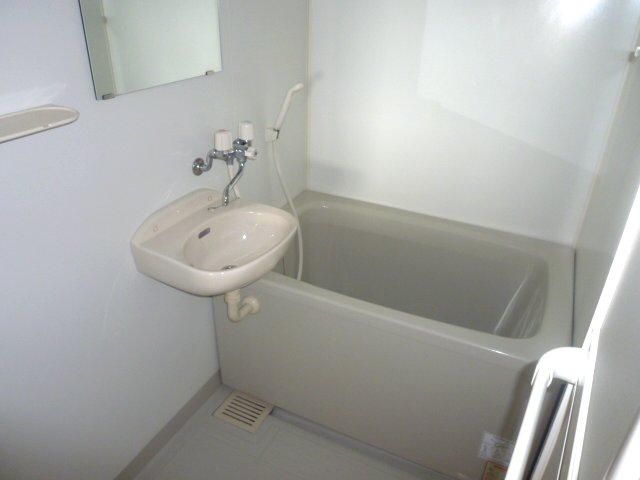 Bath. It is a wash basin with bathroom.