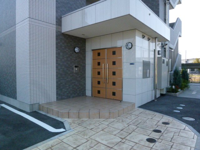 Building appearance. It is the front door with auto lock. 