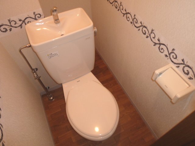 Toilet. Stylish wallpaper of separate toilet.