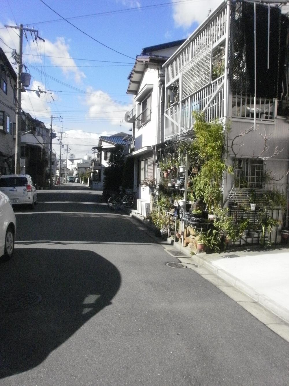 Local photos, including front road. Spacious before road