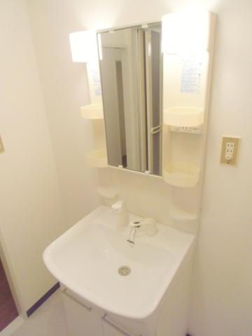 Wash basin, toilet. Wash basin with a shower
