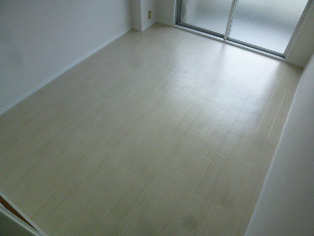 Living and room. White was the keynote flooring there is a bright, clean feeling.