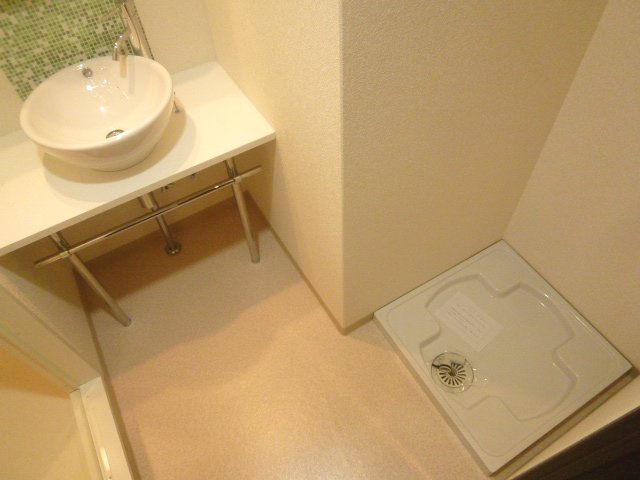 Washroom. Fashionable is a wash basin. 