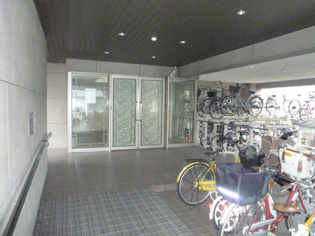 Entrance. There are bicycle parking lot. 