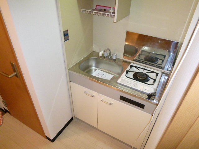 Kitchen. It comes with a gas stove 1-neck