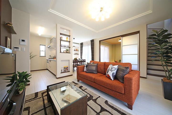 Living. Stylish living space to direct the brick wall and the fold-up ceiling.