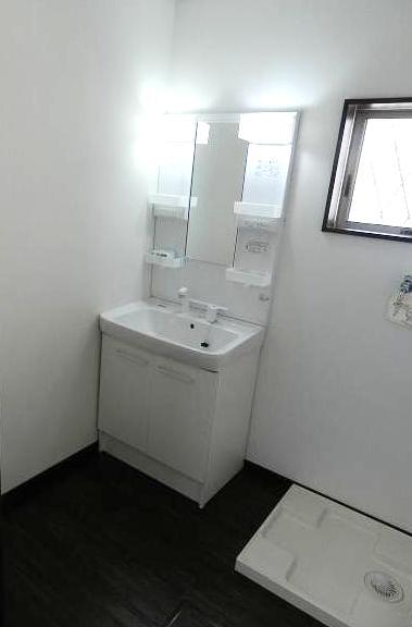 Wash basin, toilet. Washroom with a clean