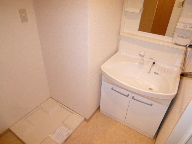 Washroom. Washbasin with popular shampoo dresser!