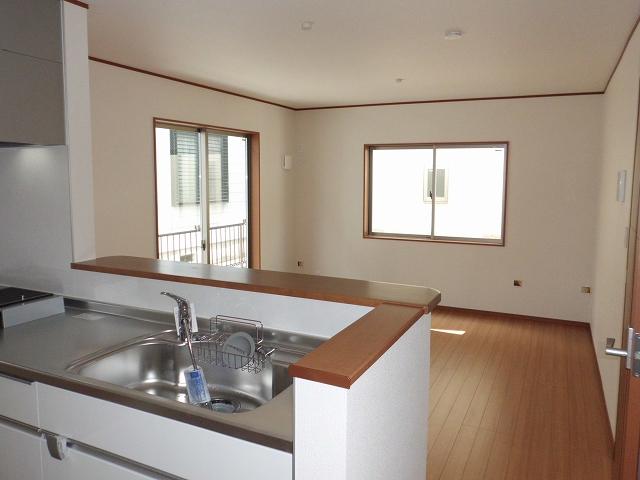 Same specifications photos (living). Floor plan overlooking the living room from the kitchen
