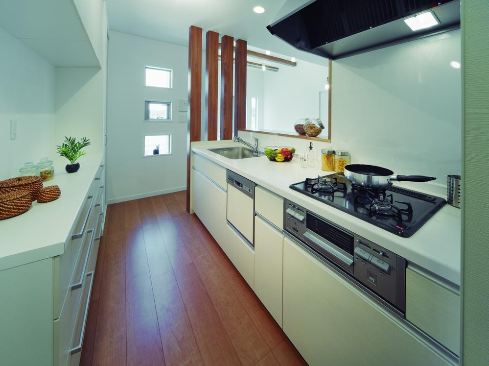 Kitchen. Because even with storage shelves in the back of the kitchen clean up well