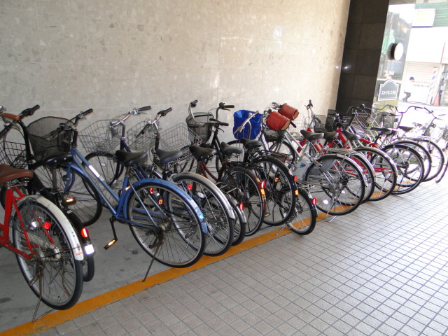 Other. Bicycle parking lot is put in front entrance with a roof. 