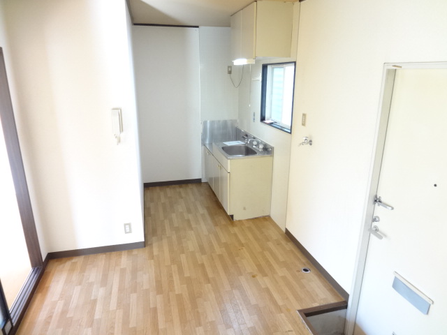 Kitchen. Kitchen space, Also offers space for a refrigerator