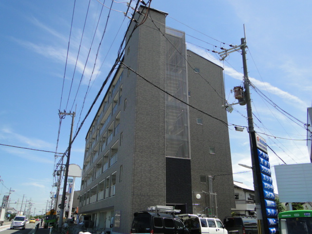 Building appearance. Right is the balcony on the left is the entrance.