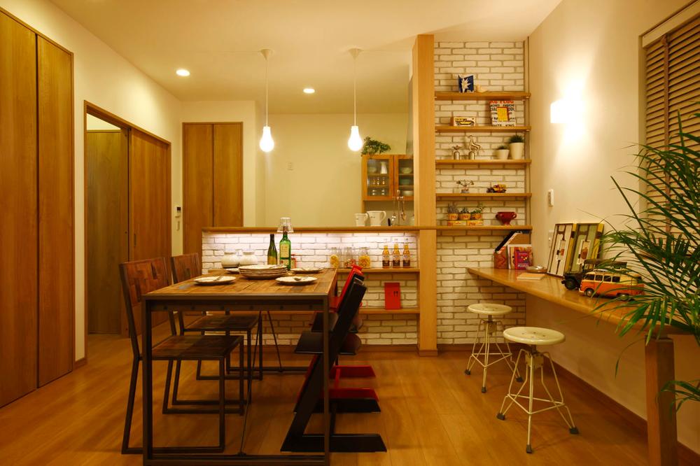 Living. Fashionable want lot of decoration that show kitchen counter with shelves. In white brick, indirect lighting. Moreover happy also another counter "Nook".