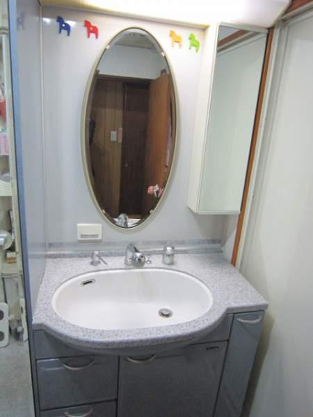 Wash basin, toilet. Washroom that has been carefully your