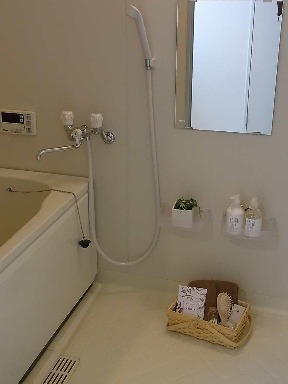 Bathroom. Bathroom with shower hose ・ mirror ・ Shelf had made