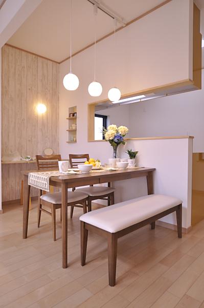 Model house photo. Bright dining space.