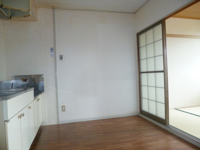 Living and room. It has a kitchen spacious.