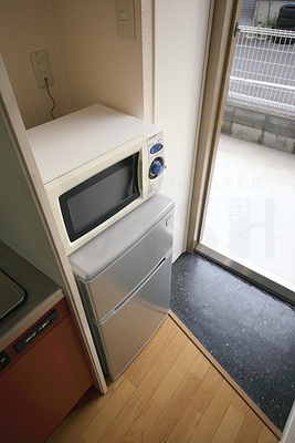 Other Equipment. Refrigerator of a two-door type, Also it comes with a microwave oven