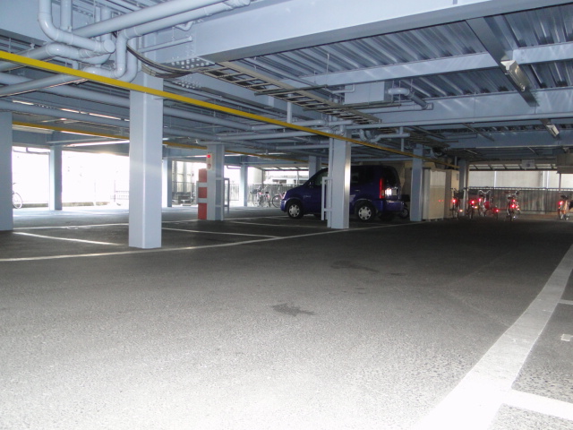 Parking lot. Parking is located on the bottom of the building