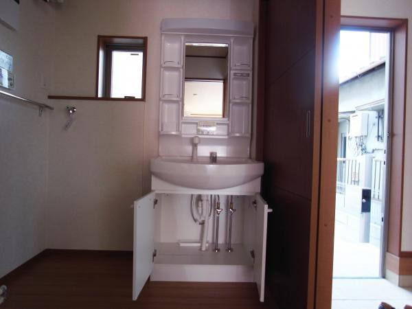 Wash basin, toilet. Plenty of storage of the wash basin with shower (same specifications as wash basin)