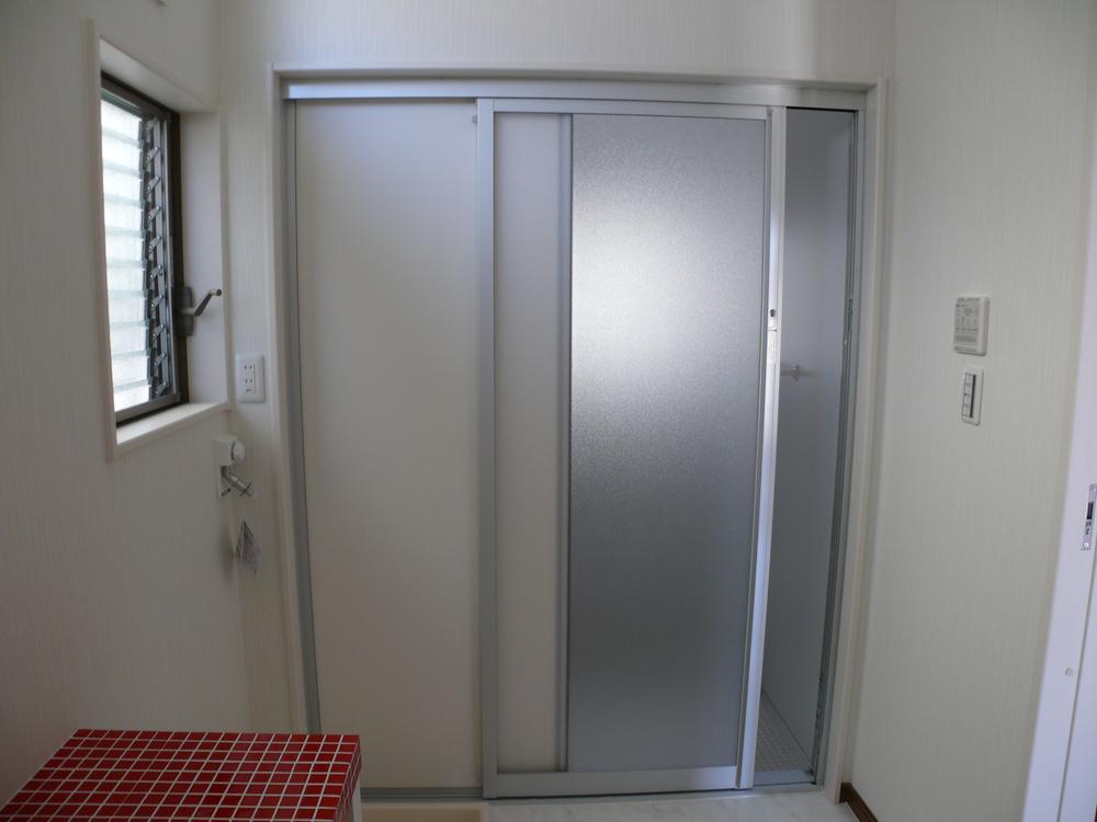 Bathroom. Bathroom is a sliding door.