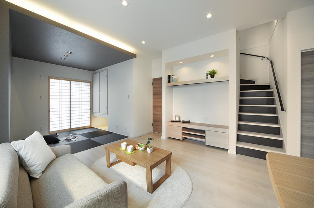 Same specifications photos (living). The continued between one from LDK to Japanese-style room, The communication space where families gather with nature by providing a living stairs. A combination of white and dark gray, Also stylish impression warm. (Local model house)