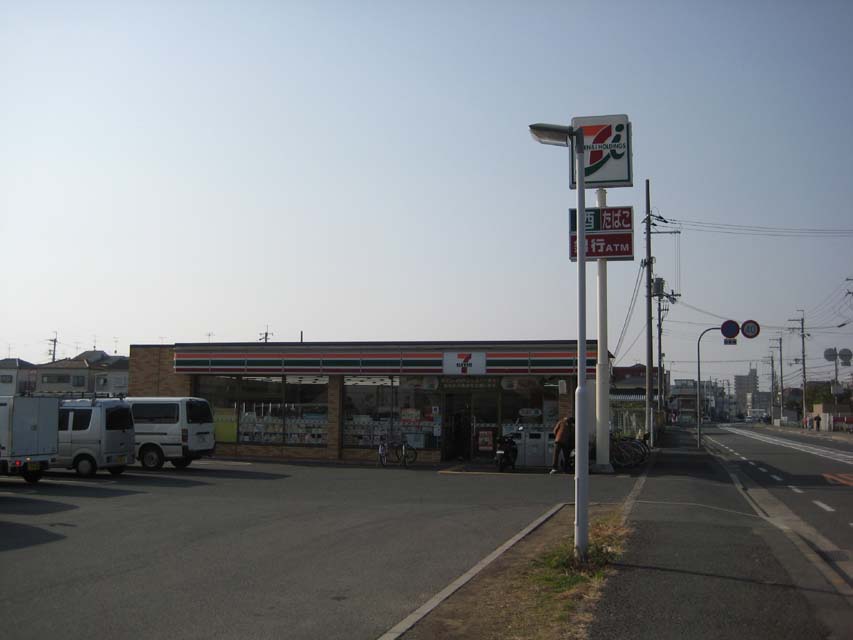 Convenience store. Seven-Eleven Matsubara Taijo store up (convenience store) 449m
