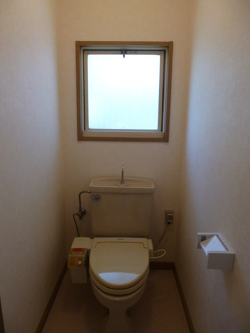 Toilet. There is toilet on the second floor