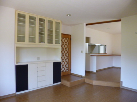 Living and room. There is built-in furniture