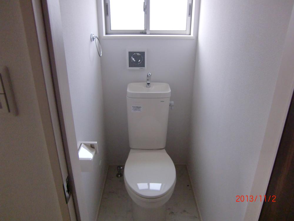 Toilet. Same specification kitchen of the company's other properties