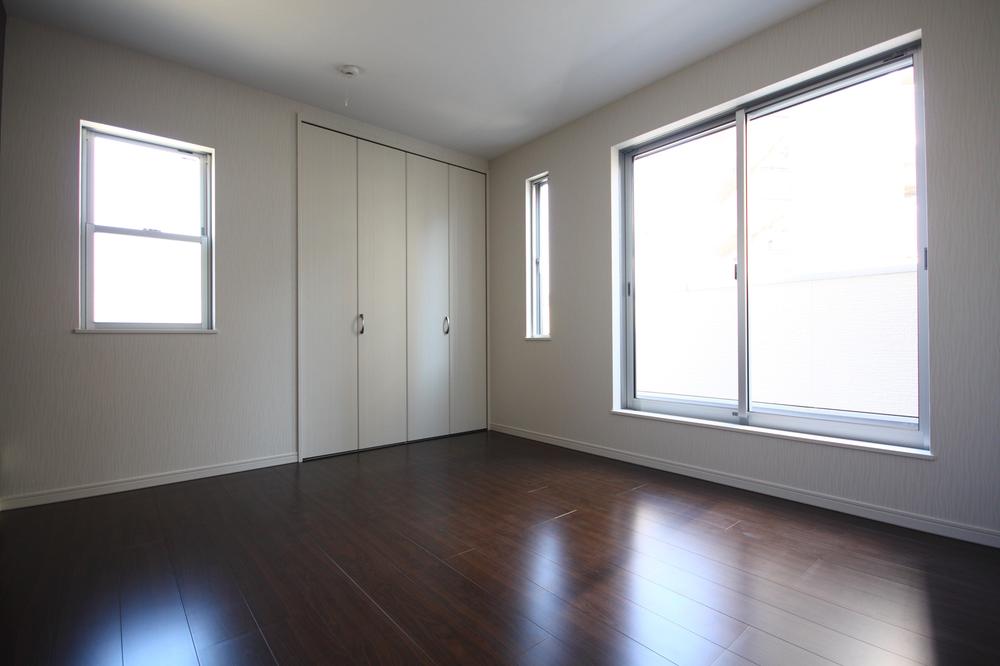 Non-living room. Western-style bathed in warm light from the large windows