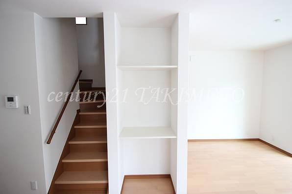 Receipt. The stairs next to you there is also a shelf!