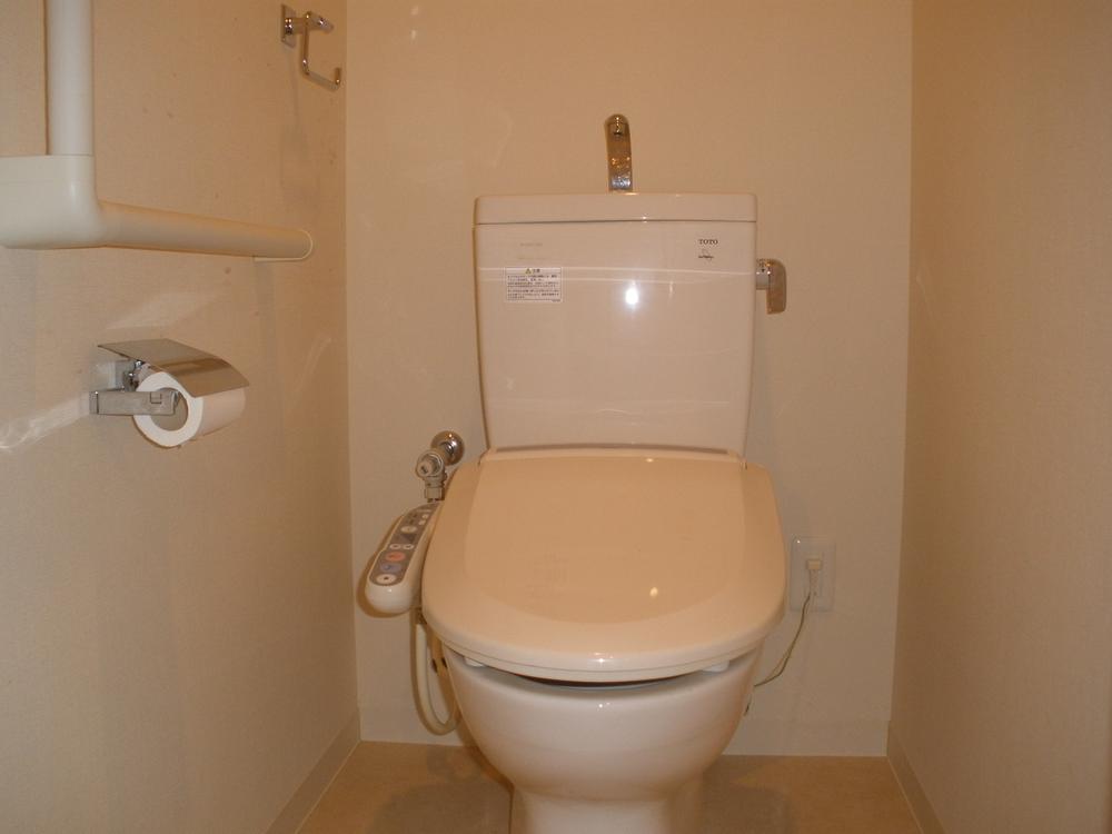 Toilet. It is a photograph of the toilet.