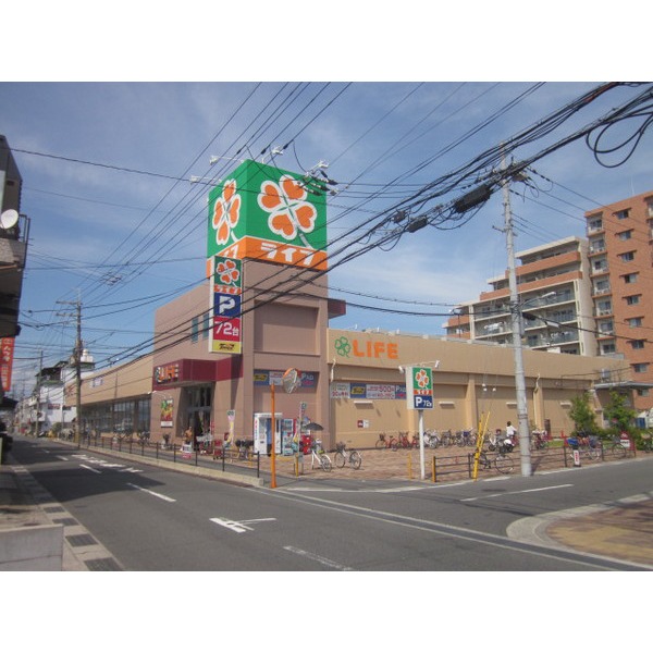 Supermarket. 585m up to life Neyagawa Kurobaru store (Super)