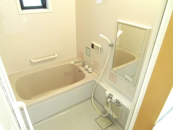Bathroom. There is a bath also window, Also equipped with bathroom dryer