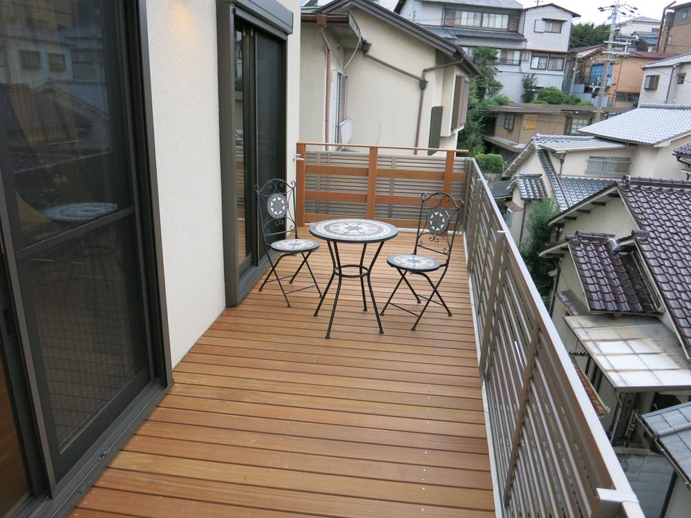 Other. Wood deck that follow from living