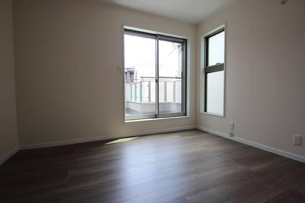 Non-living room. Window leading to the balcony is large