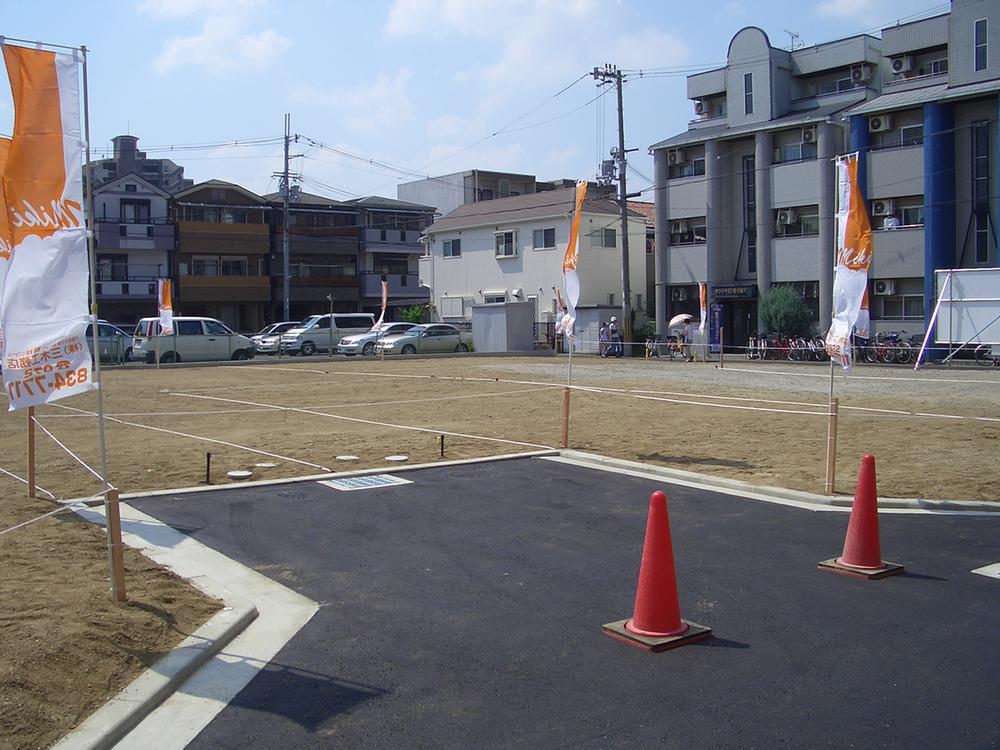 Local photos, including front road. Clean development subdivision in