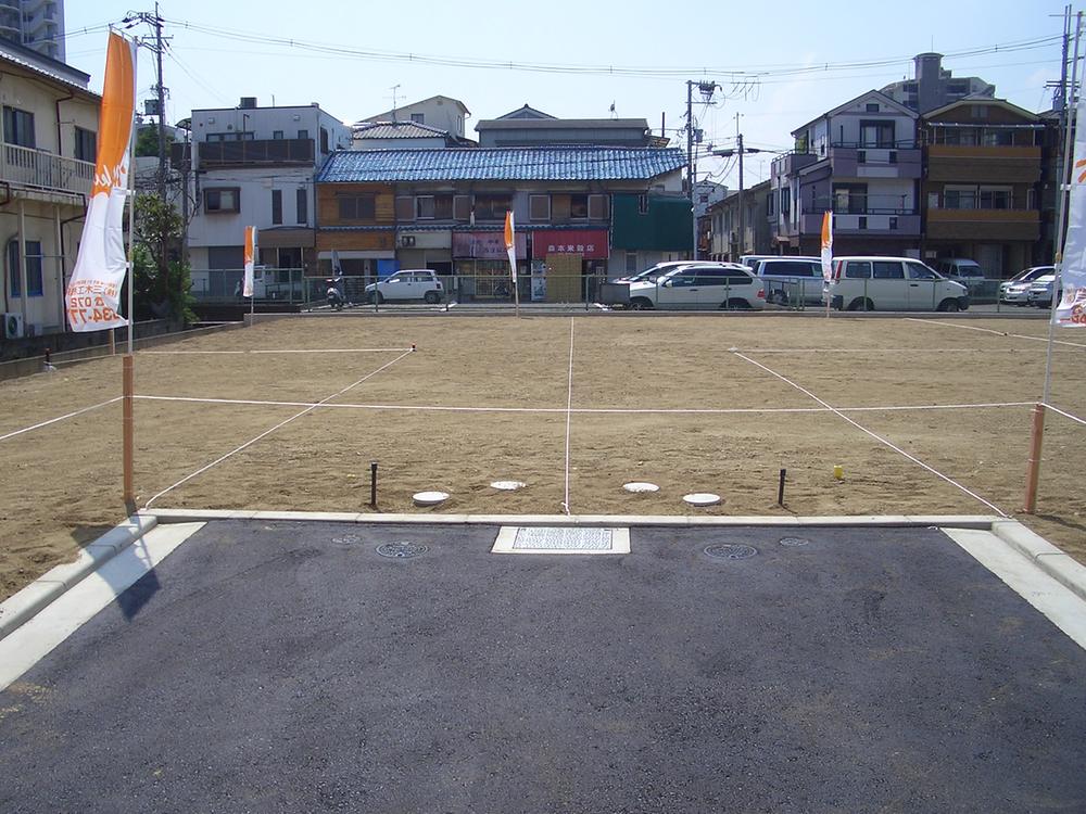 Local photos, including front road. Clean development subdivision in