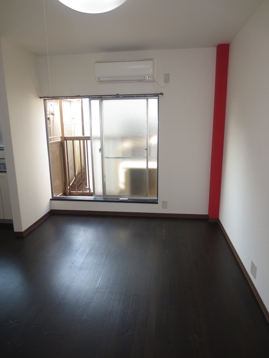 Living and room. It is muted colors of the room.