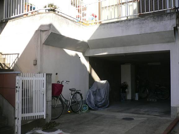 Parking lot. The garage comes with shutter! 