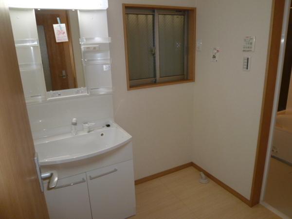 Wash basin, toilet. Dressed in smooth wash room of the room