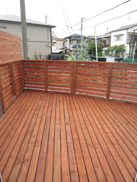 Balcony. Spacious wood deck!