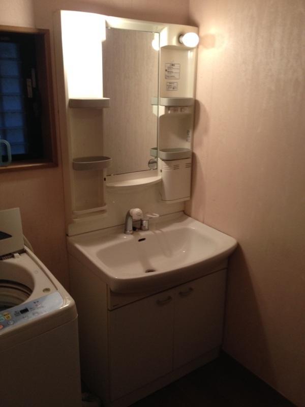 Wash basin, toilet. Washroom is also beautiful to your