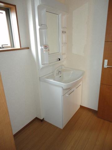 Wash basin, toilet. Wash