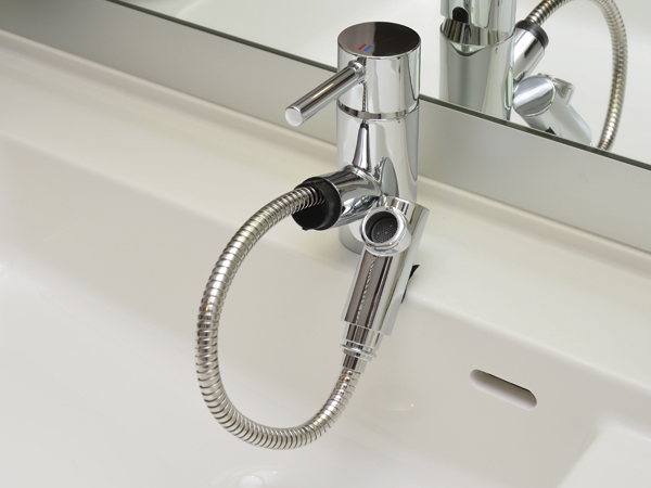 Bathing-wash room.  [Stretchable single lever mixing faucet] Pull out installation stretchable single lever mixing faucet that can be used in a bowl of care and shampoo (same specifications)